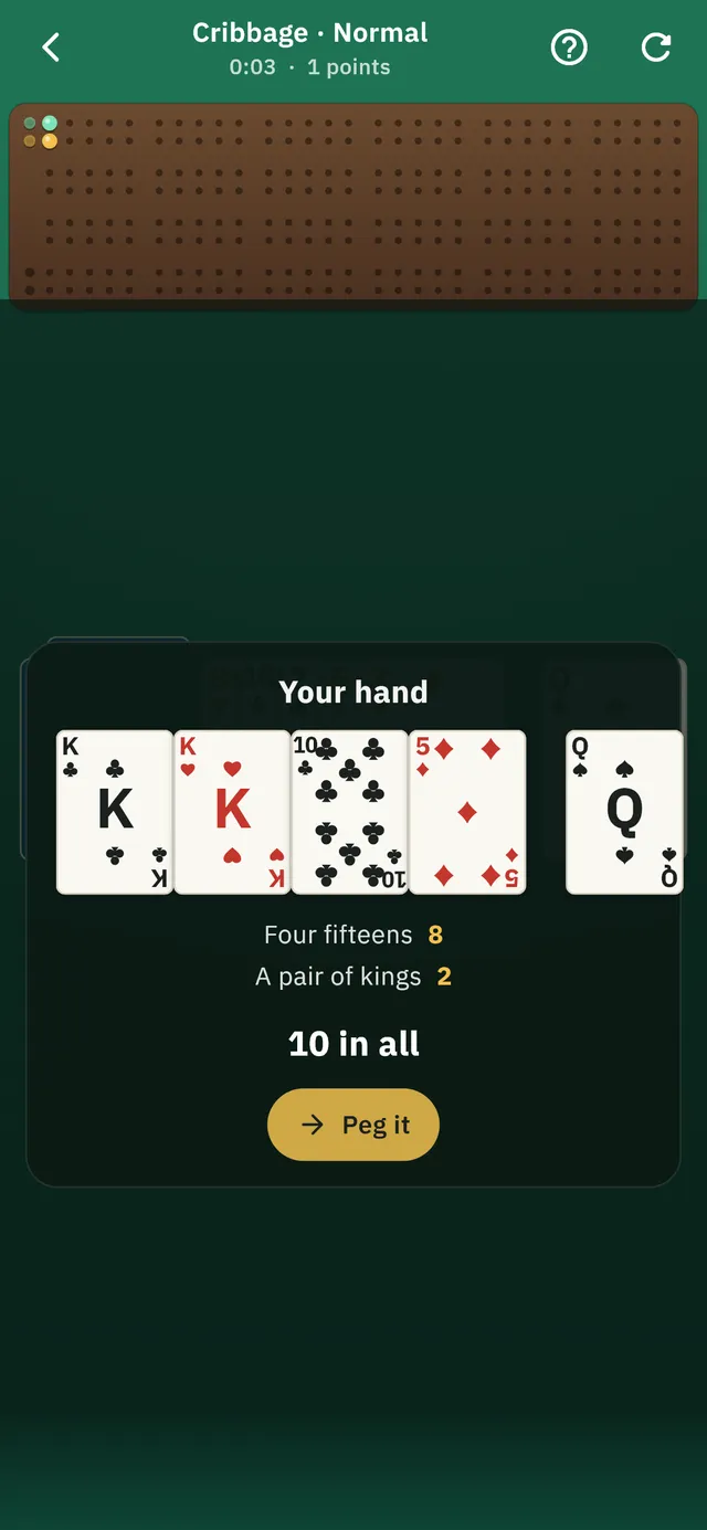 A Cribbage hand being counted, with the pegging board above the cards.